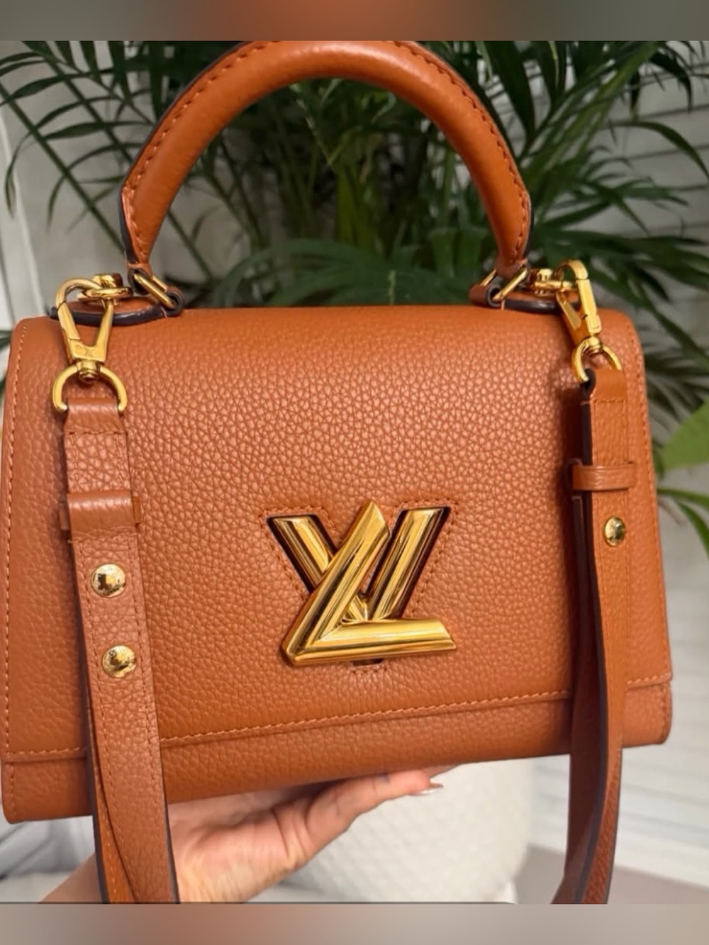 Elegant Tan Leather Top-Handle Bag with Gold Hardware